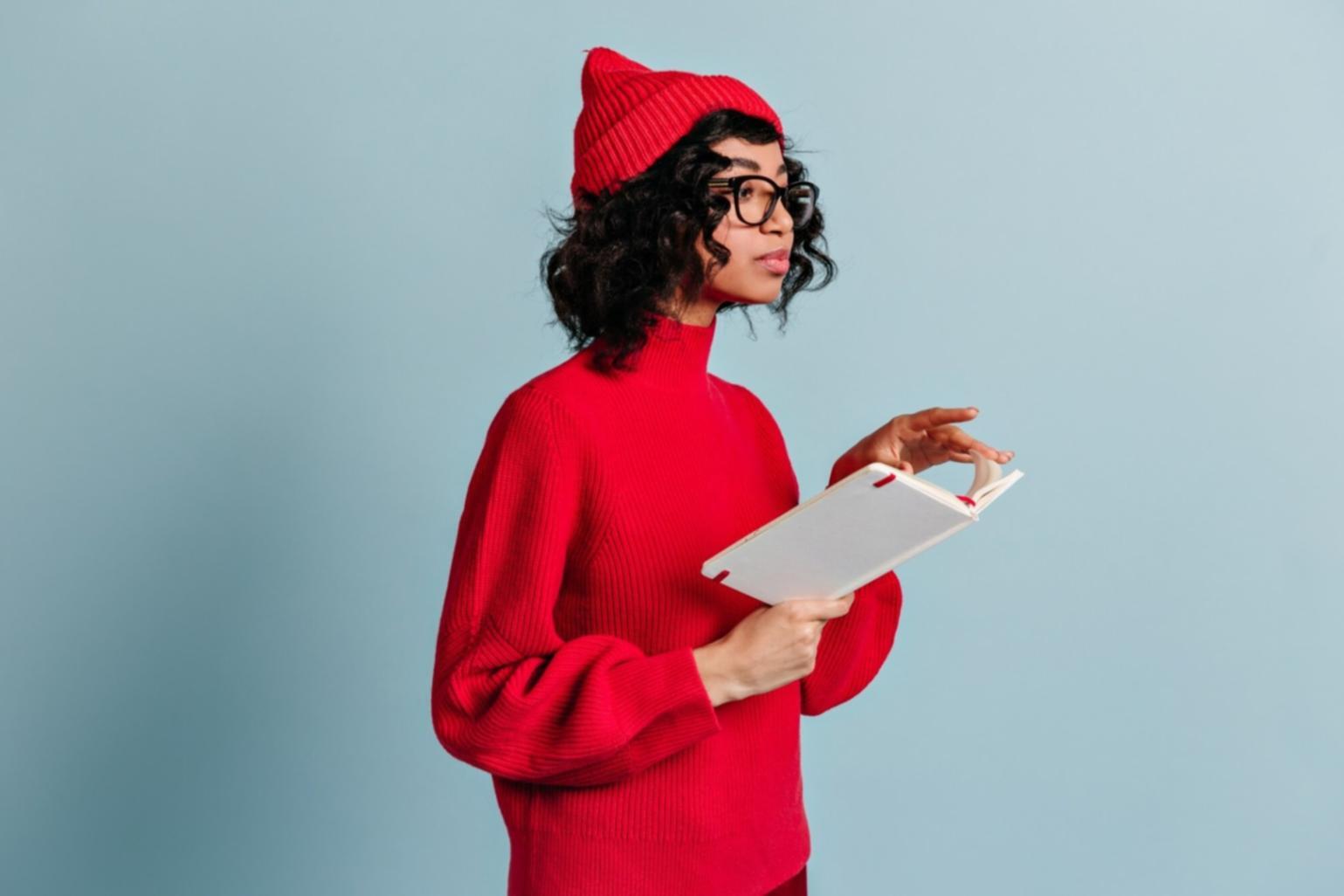 Entrepreneur reviewing business plans and financial projections on laptop screen