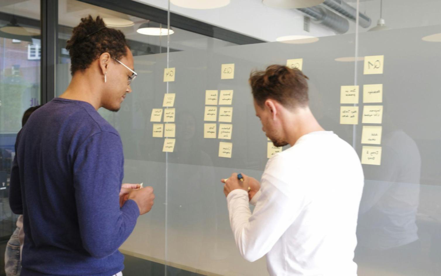 Early morning planning session with financial documents spread across workspace